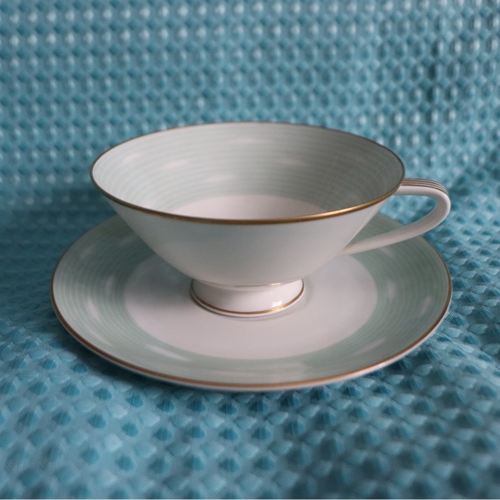 Elegant White and Gold Trim Teacup and Saucer Set